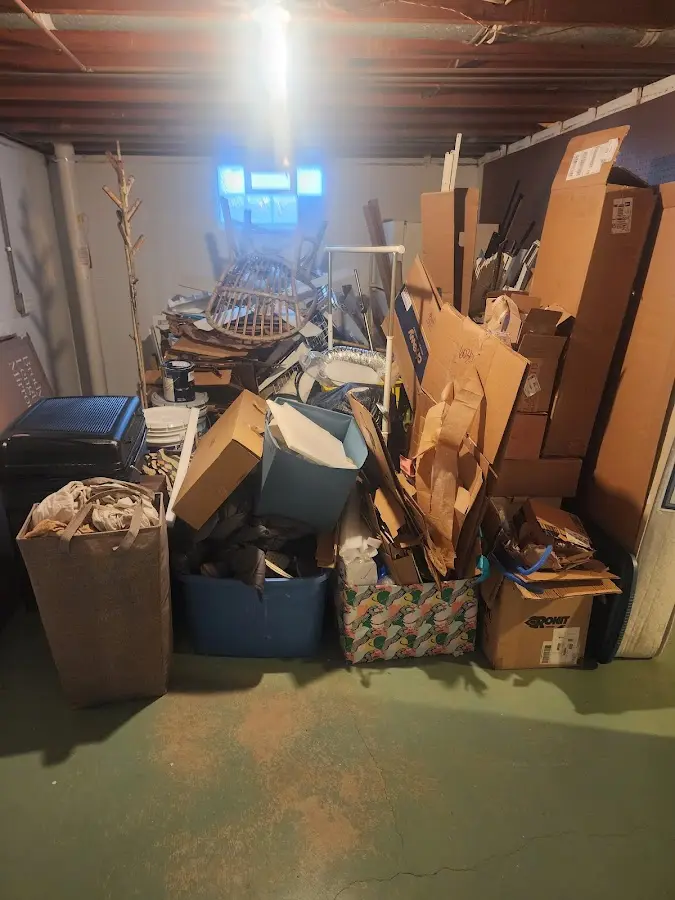 Roll-off dumpster container at job site for Construction Dumpster Rental in Winchester